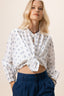 Notre mannequin porte la blouse Palifa White