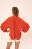 Notre mannequin porte la blouse AYA couleur Deep Orange 5