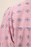 Notre mannequin porte la blouse Palifa en rose vintage 4